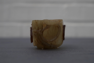 A Chinese lotus-shaped russet jade libation cup, 18/19th C.